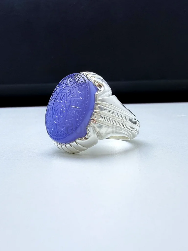 A ring with a blue Yemeni agate stone, engraved63174324114433111