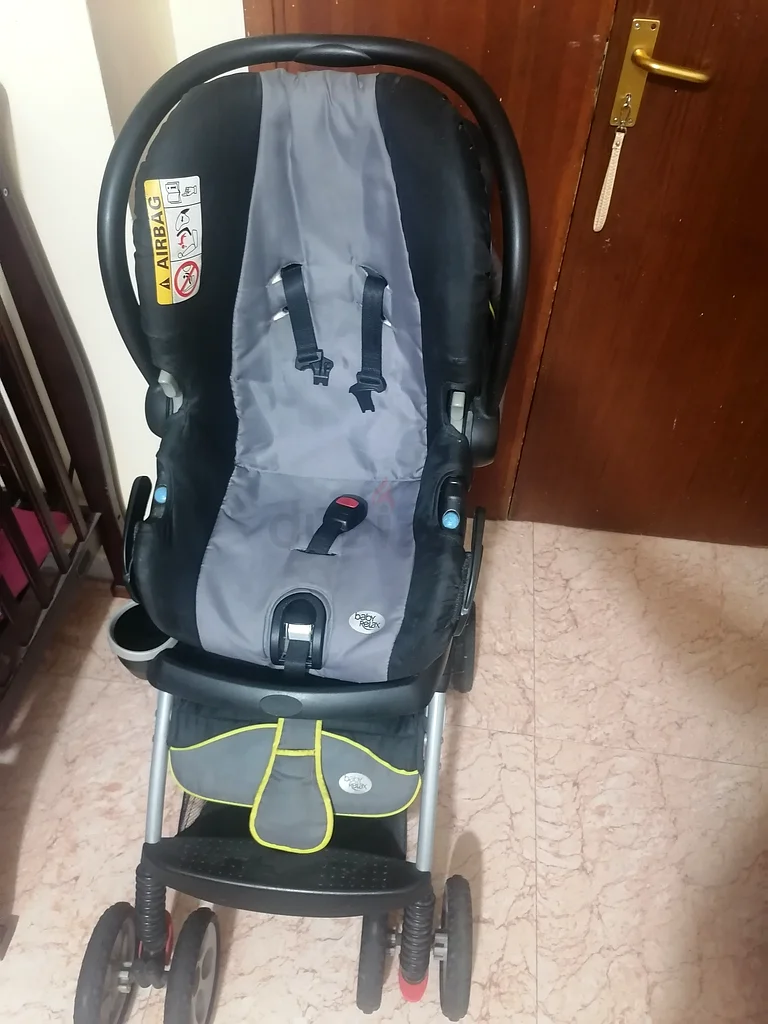 عربة أطفال مع مقعد سيارة632078879955211129
