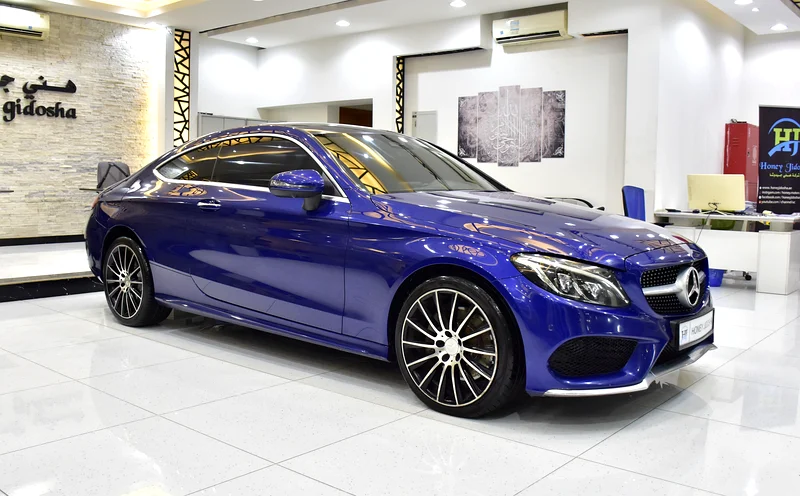 EXCELLENT DEAL for our Mercedes-Benz C300 Coupe (2016 Model) in Blue Color, GCC Specs63163859477761112