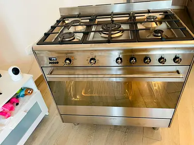 Smeg top five burner gas electric oven 90cm
