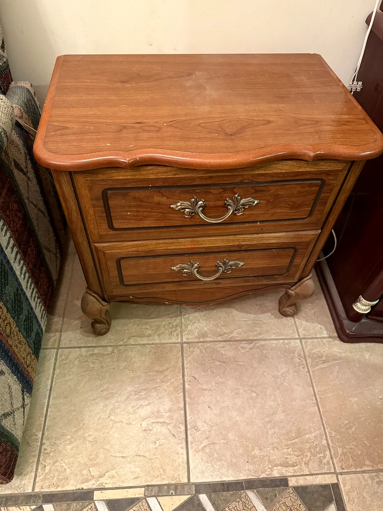 Charming Vintage Wooden Nightstand with Intricate Handles632183158338571112