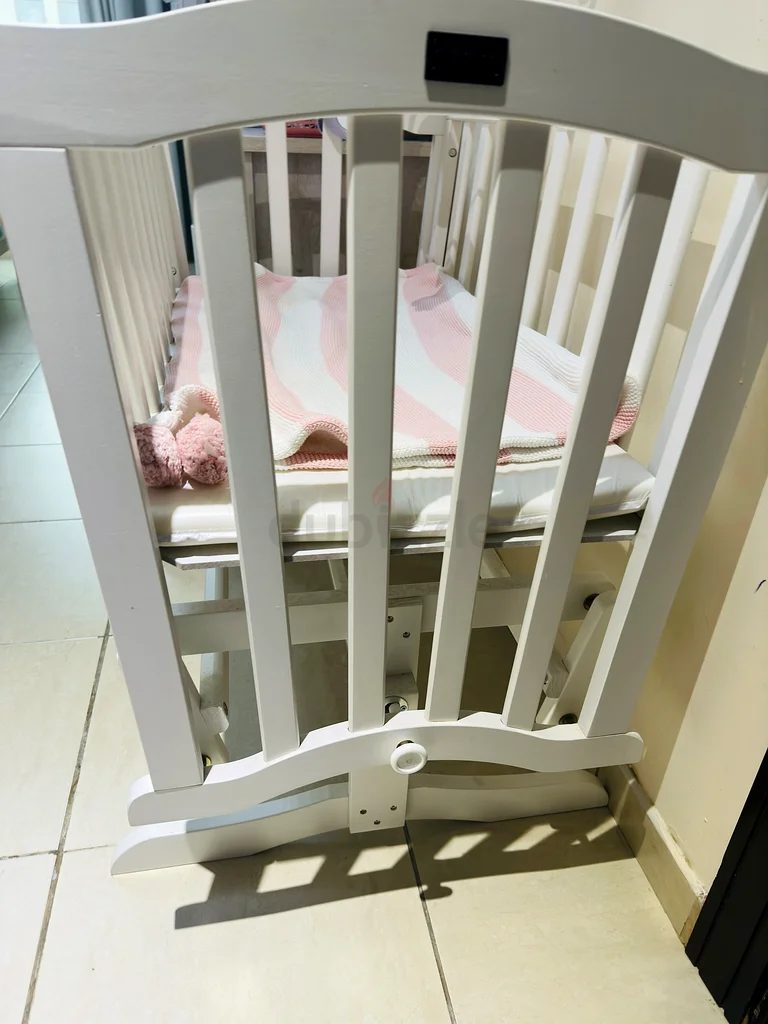 Charming White Rocking Cradle with Melodic Mobile from Giggles Brand63204862877443113