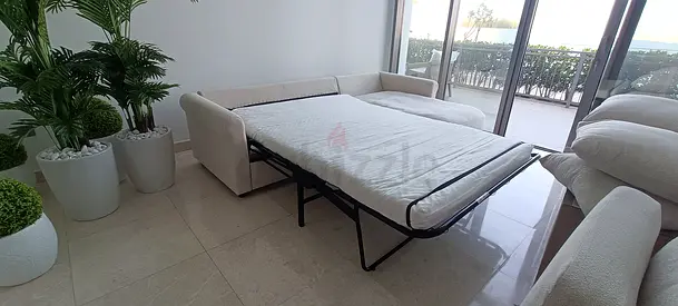 Almost like new condition Ikea gronlid L shape sofa bed beige