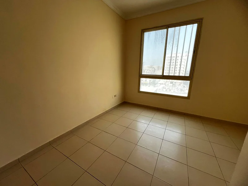 Two-bedroom apartment with balcony and built-in closets in Al Qulai’a, available with flexible 4-cheque payment plan.62890342131331112