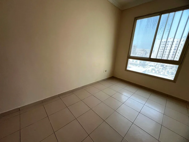 Two-bedroom apartment with balcony and built-in closets in Al Qulai’a, available with flexible 4-cheque payment plan.62890342131331113