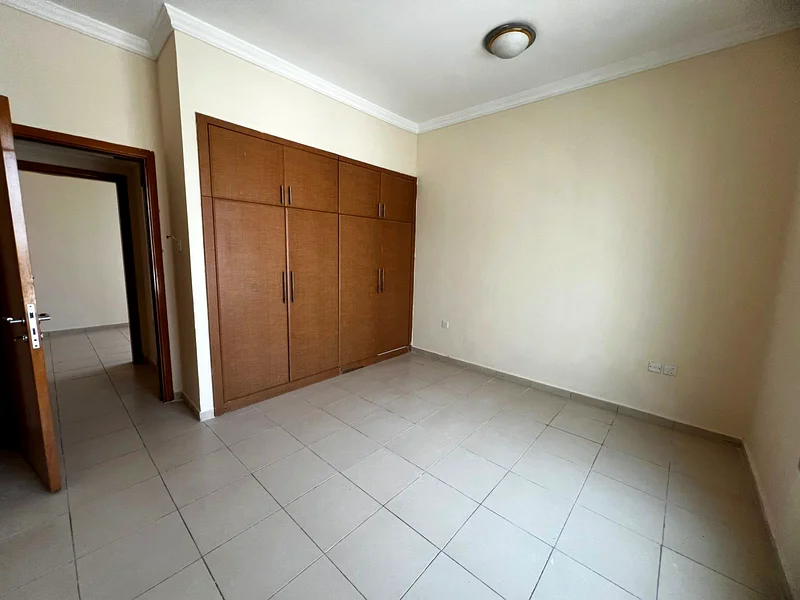 Two-bedroom apartment with balcony and built-in closets in Al Qulai’a, available with flexible 4-cheque payment plan.62890342131331111