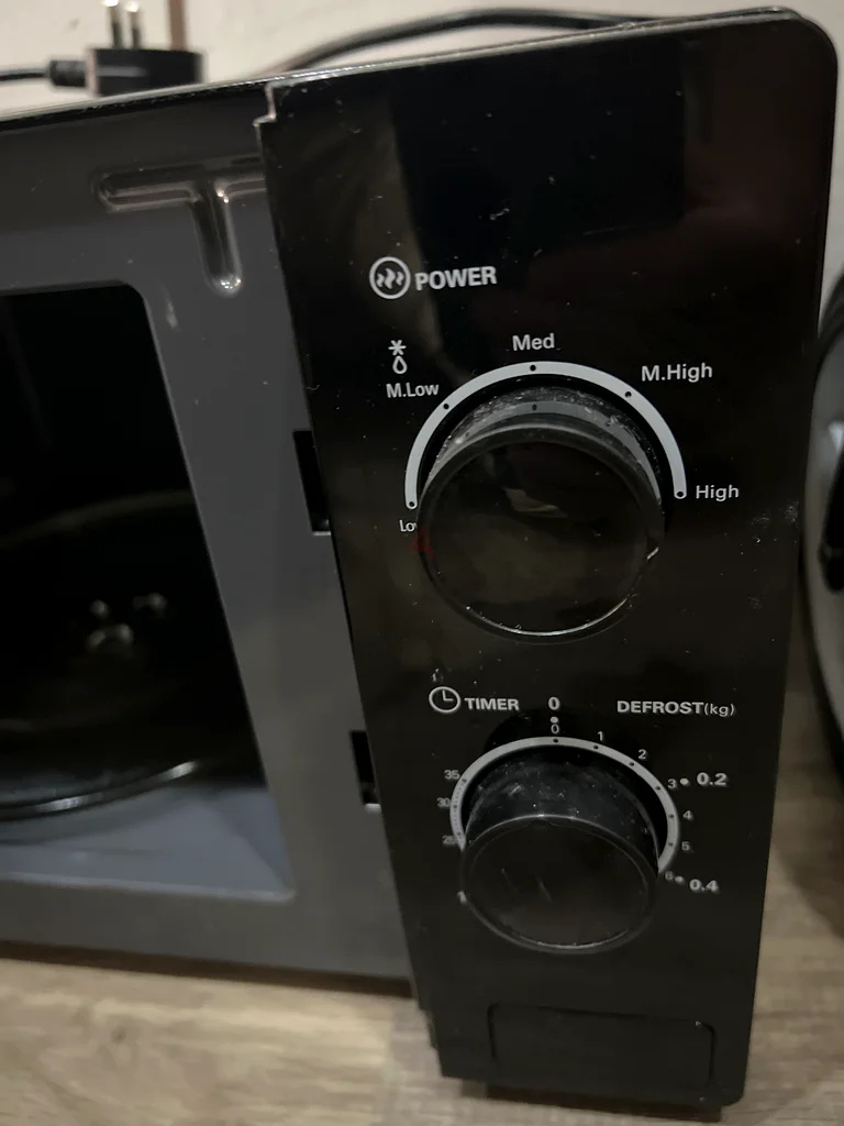 Compact Black Microwave Oven - Perfect for Any Kitchen!63168993911170112