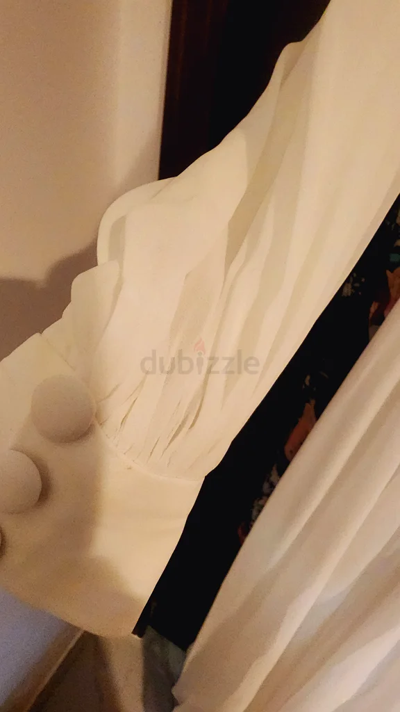 فستان أبيض أنيق63239079743106113