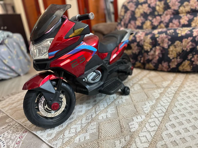 Ride in Style: Kids Electric Motorcycle62864710028418112