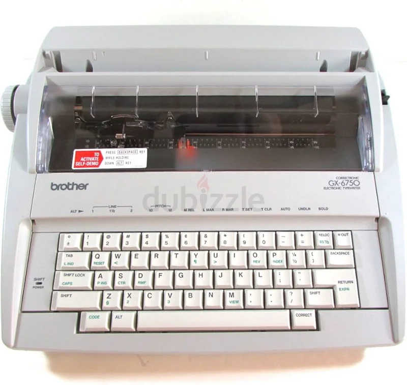 آلة كاتبة كهربائية من براذر GX-6750 ذات عجلة دوارة احترافية62929655389827111