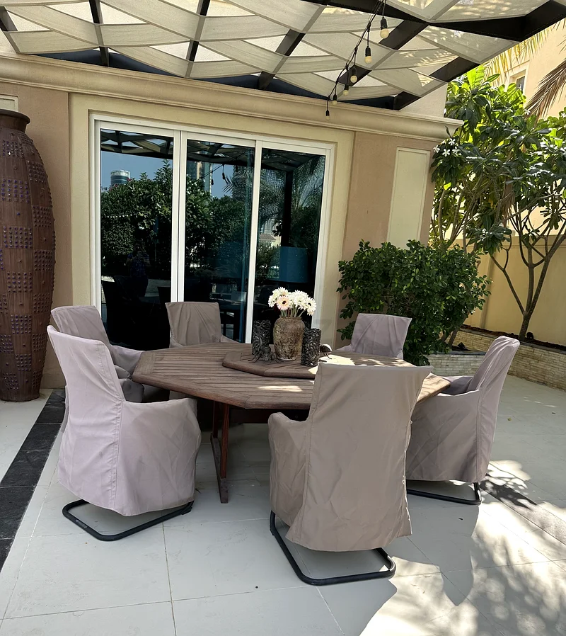 Stylish Outdoor Dining Table from Suncoast with Free Chairs63186761922179114