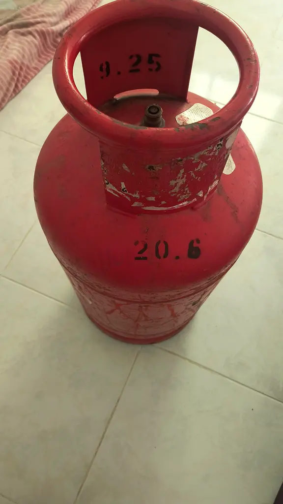 Gas cylinder medium almost full gas with regulator and pipe