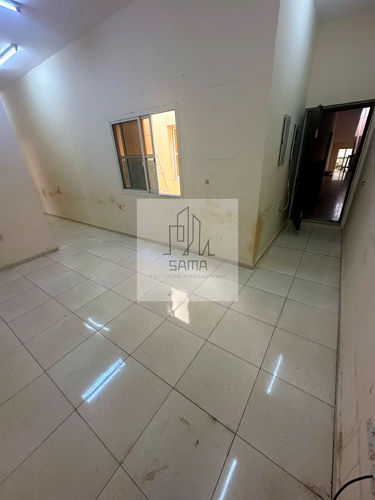 Two rooms, a living room, a kitchen, and two bathrooms within a building in the Al-Matawah area.62868800251265114