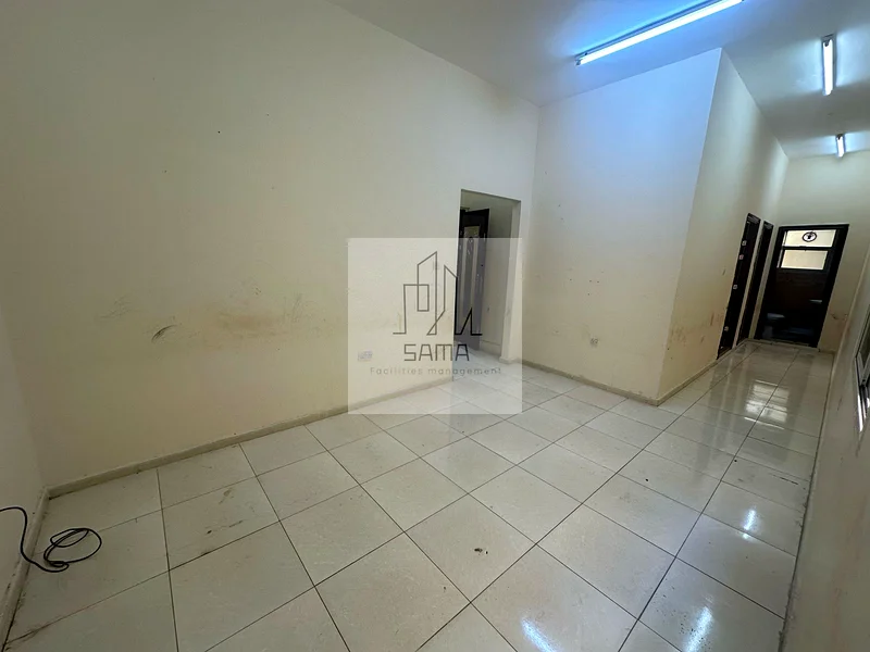 Two rooms, a living room, a kitchen, and two bathrooms within a building in the Al-Matawah area.62868800251265113
