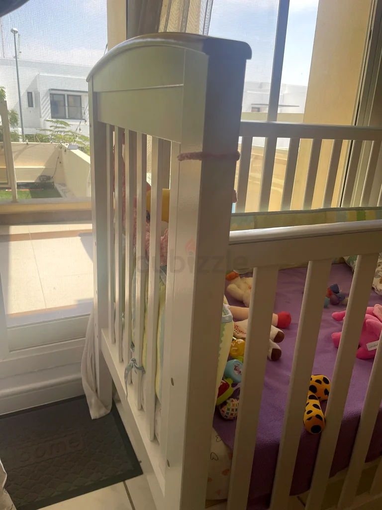 Giggles convertible crib + Mattress and mattress protector. Well loved and in perfect condition.62864710962563118