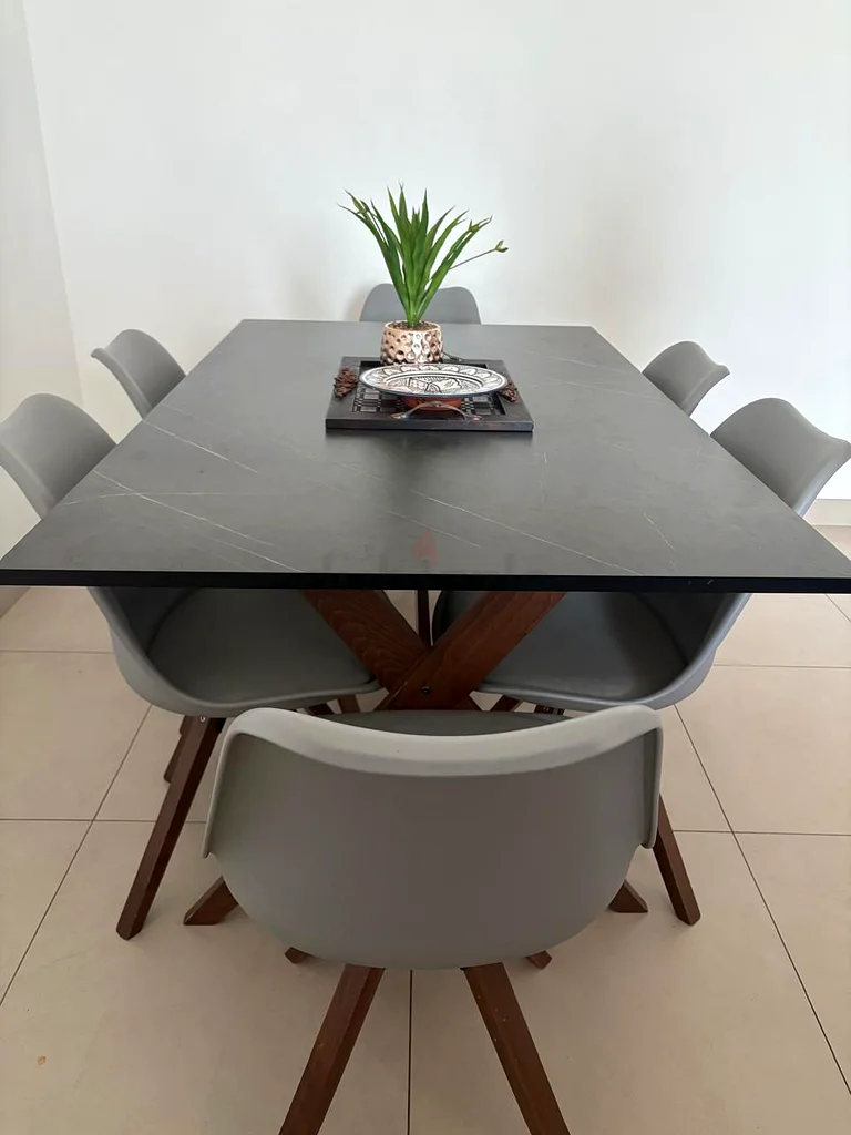Stylish dining table with 6 chairs - Purchased from Pan Emirates63216833301122112