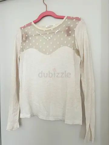White long sleeve top