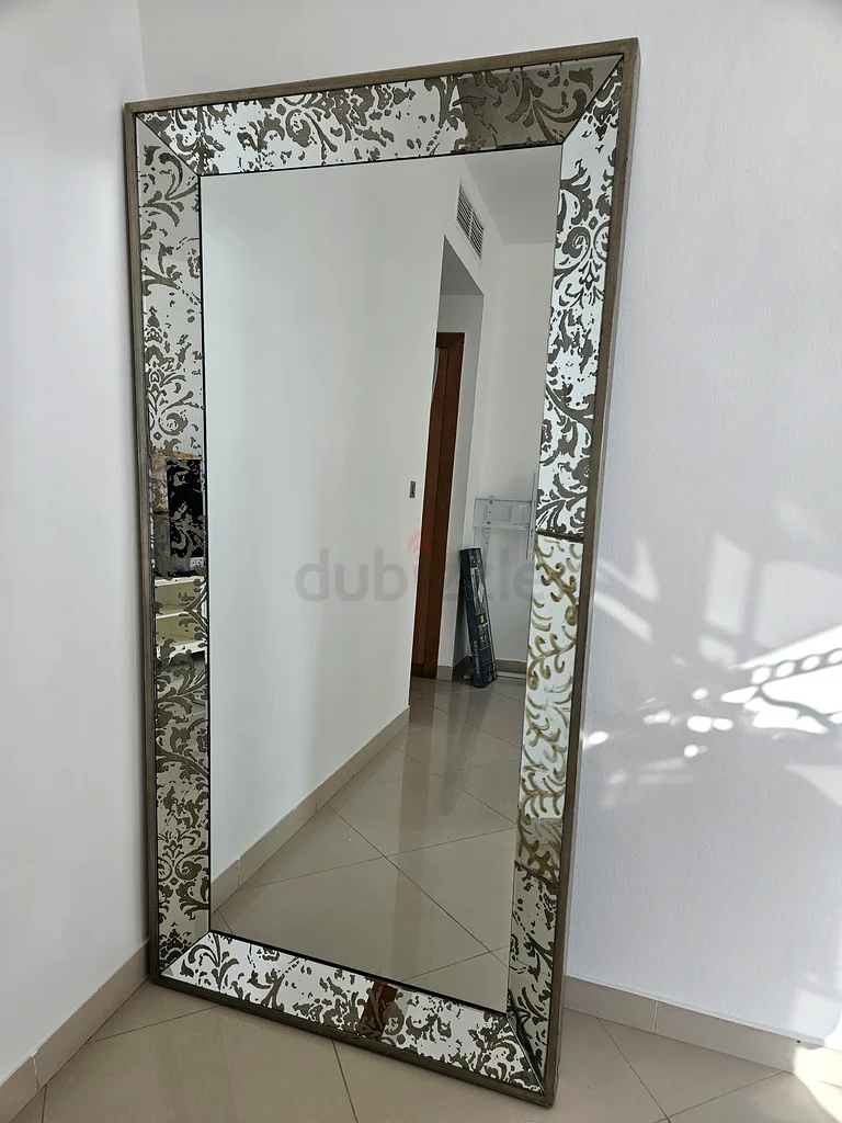 Elegant Wall-Mounted Mirror with Intricate Design from The One62865809189634111