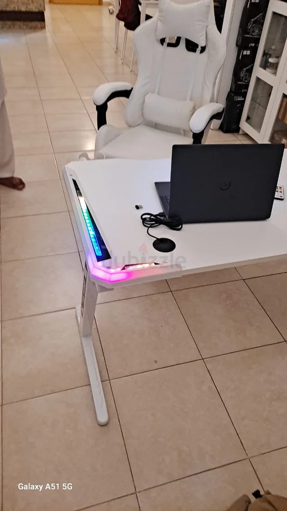 Brand new gaming table and gaming chair available62931681323521111