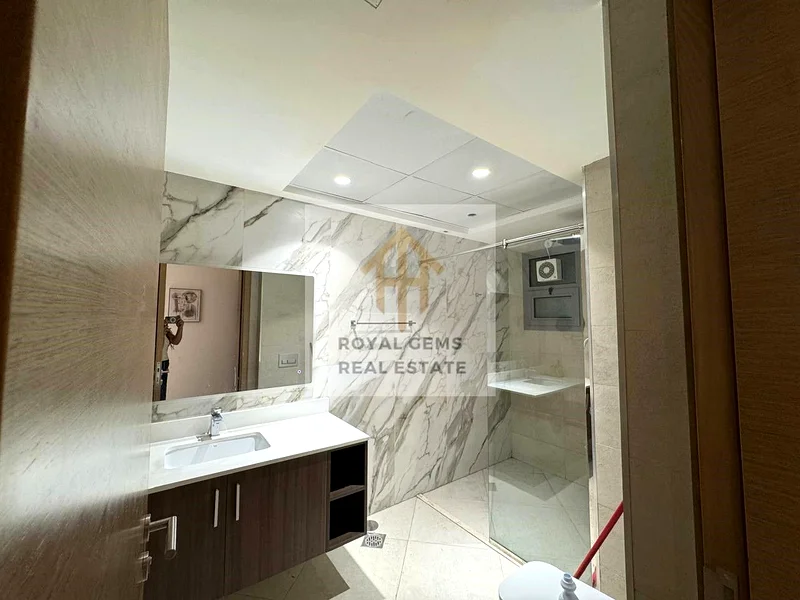 Furnished room and hall for yearly rent, in Gulfa Ajman Towers, priced at 50,000 with Barking , with Gym and pool.62867823246211112