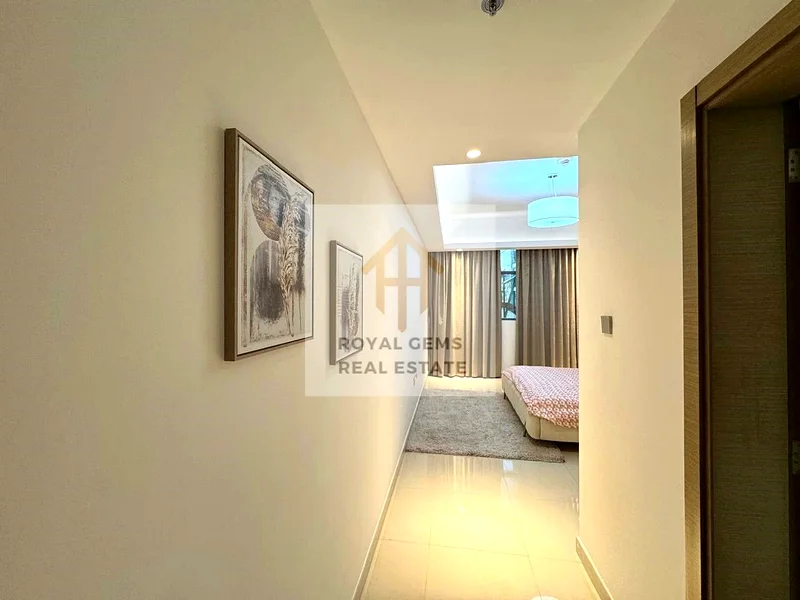 Furnished room and hall for yearly rent, in Gulfa Ajman Towers, priced at 50,000 with Barking , with Gym and pool.62867823246211113