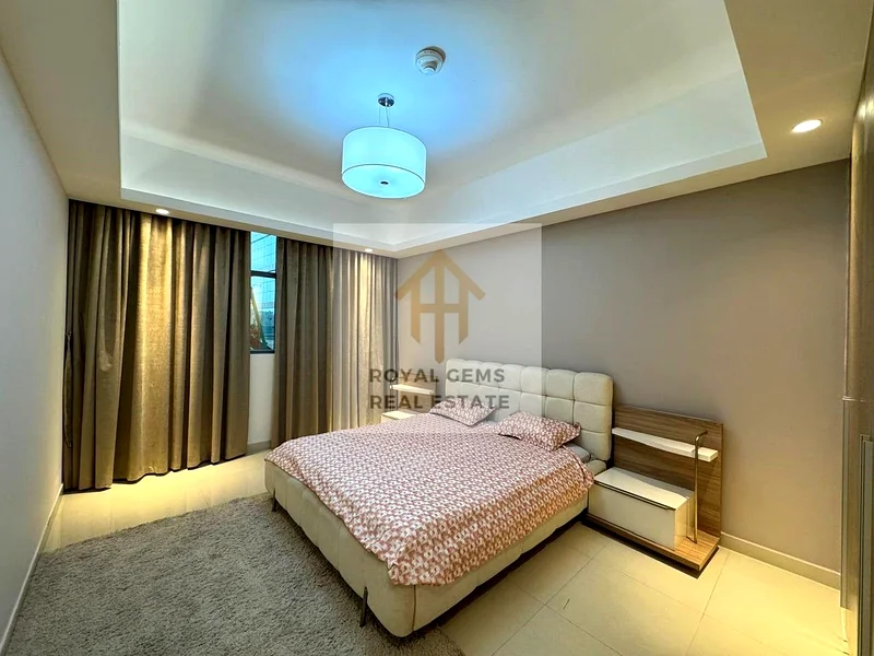 Furnished room and hall for yearly rent, in Gulfa Ajman Towers, priced at 50,000 with Barking , with Gym and pool.62867823246211114