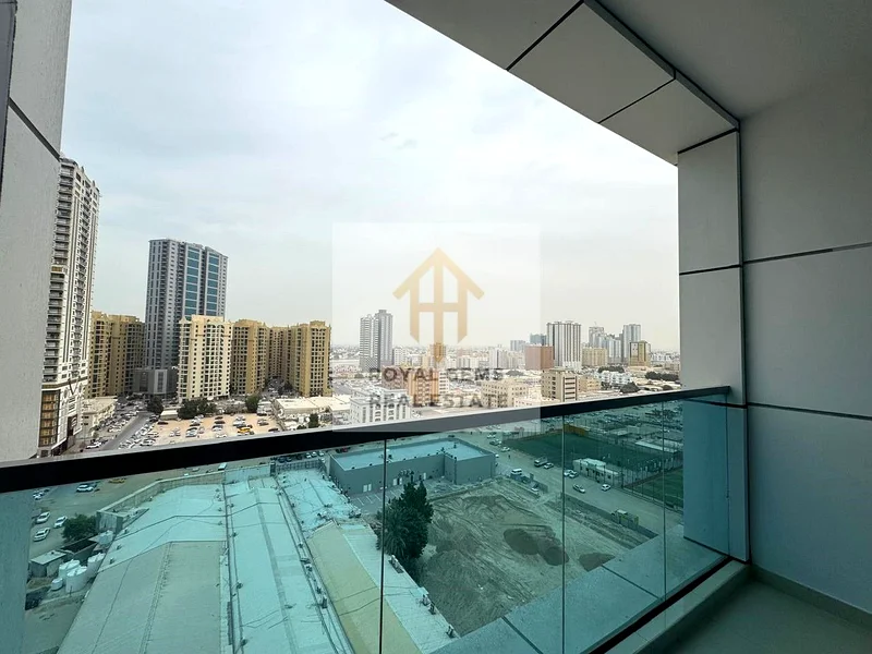 Room and hall for yearly rent, in Gulfa Towers Ajman, at 40,000 with Barking, open view, with Gym and pool, and baby play area.62867823253250114