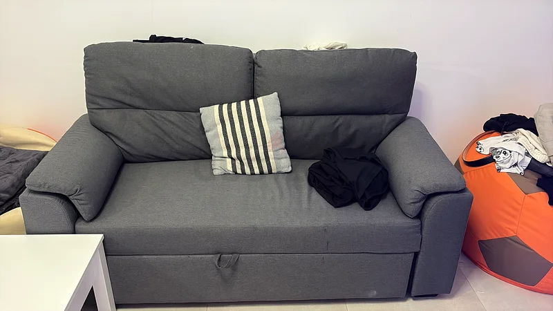 Grey Sofa that has extra leg space and becomes a functional bed628638222283541124