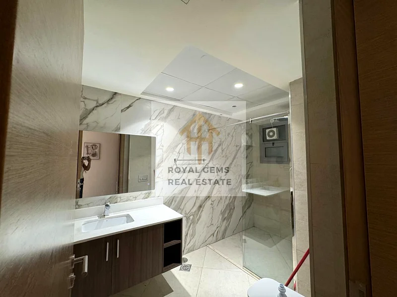 Room and hall for yearly rent, in Gulfa Towers Ajman, at 50,000 with Barking, open view, with Gym and pool, and baby play area.62867823189122114