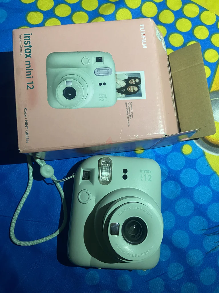 احصل على ذكريات فورية مع Fujifilm Instax Mini 12!62931671738627112
