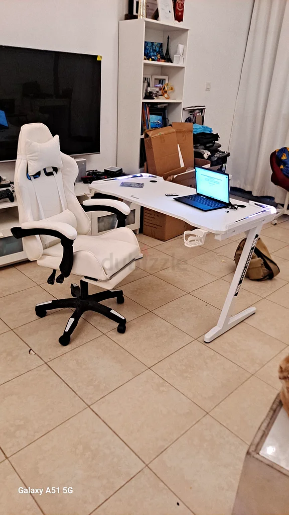 Brand new gaming table with gaming chair available62930645776131117