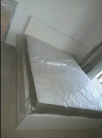 IKEA malm king size bed with mattress and 2 storage drawers for sale