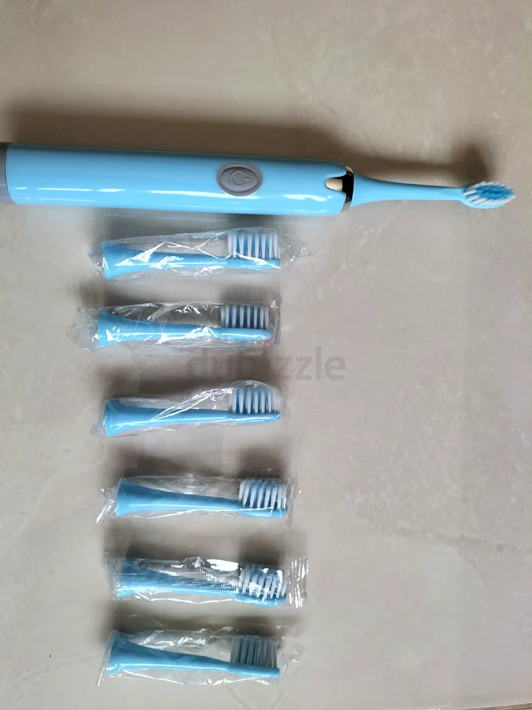 Sonic Blue Electric Toothbrush with Extra Brush Heads - Brand New!632431907508511117