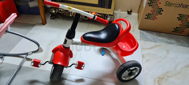 Exciting Red Tricycle for Your Little Racer!63170852492289112