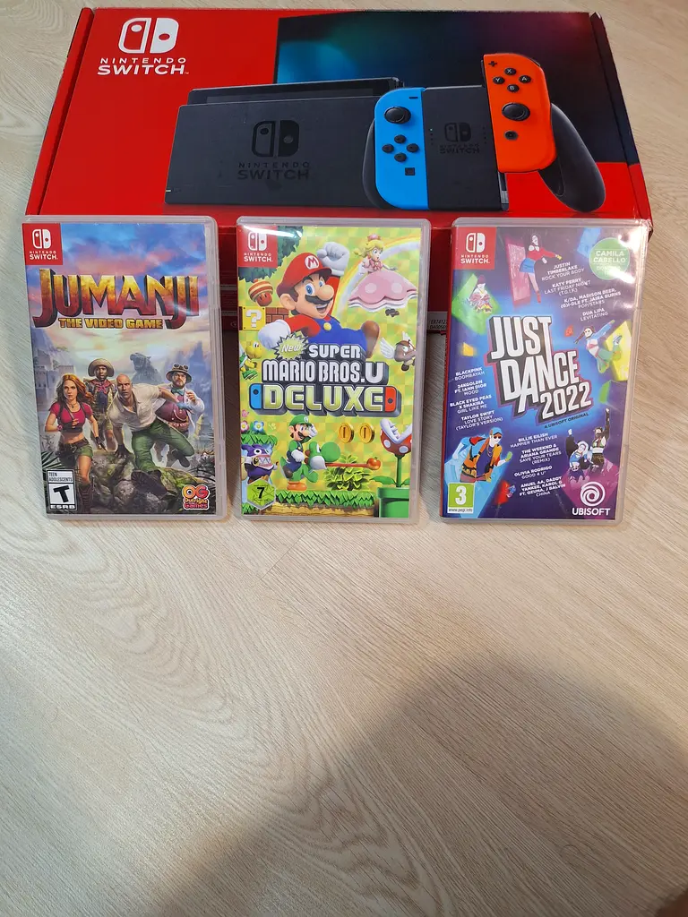 Nintendo switch with 2 games and accessories
