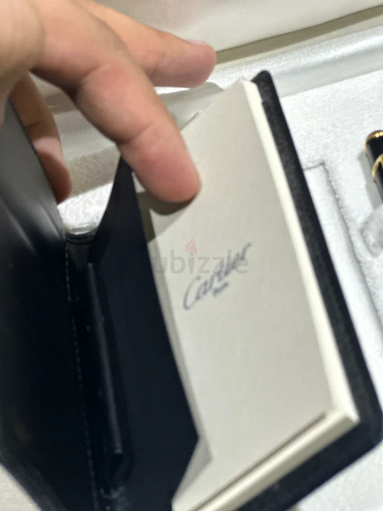 قلمان حبر من كارتييه وقلم رصاص مستعمل مع دفتر كامل.63223850316930112