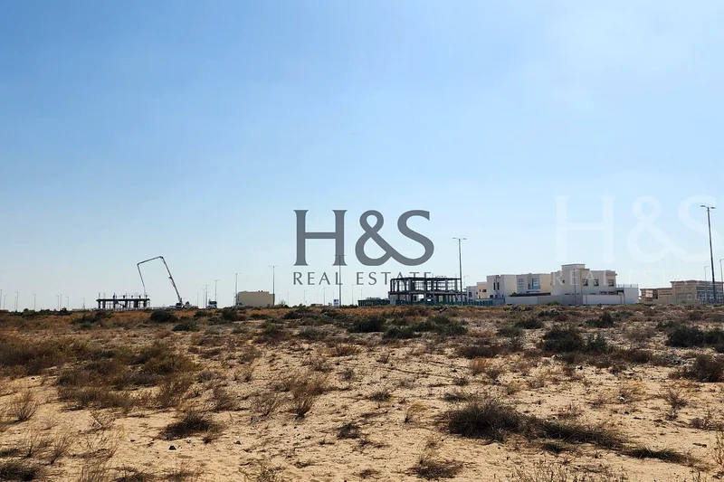 قطعة أرض سكنية | ملكية تامة | بدون رسوم خدمة مدى الحياة | صفقة للمستثمر | في تلال سيتي، الشارقة على طريق الإمارات63183716416515114