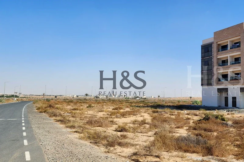 قطعة أرض سكنية | ملكية تامة | بدون رسوم خدمة مدى الحياة | صفقة للمستثمر | في تلال سيتي، الشارقة على طريق الإمارات63183716416515113