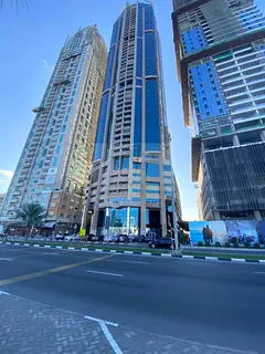 Luxury Apartment for Sale in Al Sundus Tower – Al Mamzar, Sharjah | Side View of Al Mamzar Lake