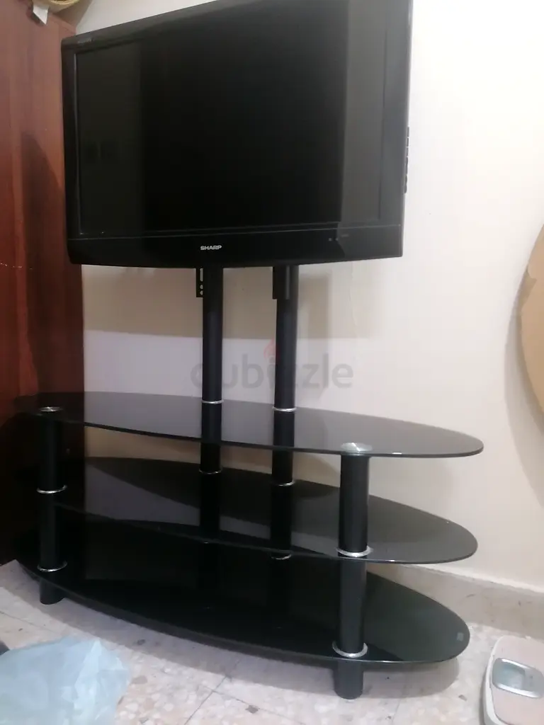 Stylish Flat Panel TV with Elegant Stand for Sale!
