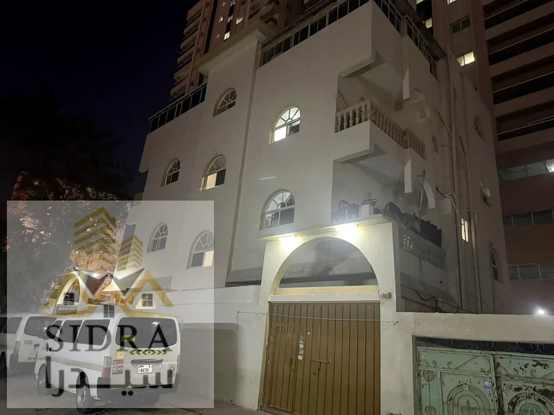 **Building for Sale in Al Rumaila with Prime Location and Excellent Rental Income**63255516532994110