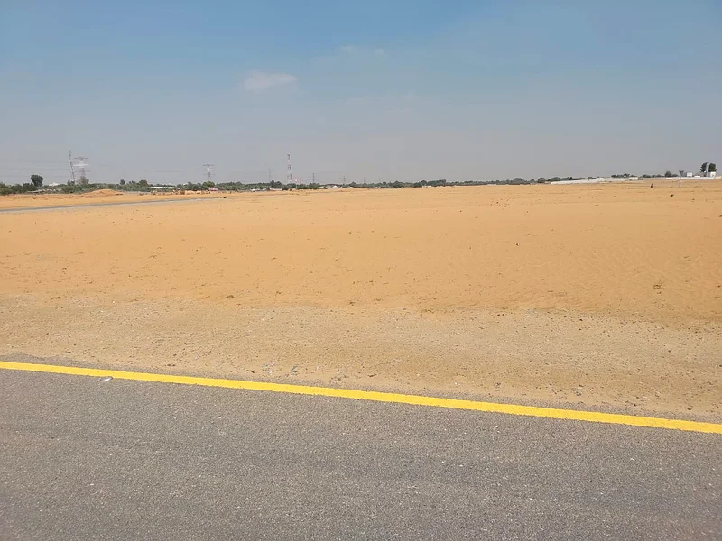 للبيع: قطعة أرض في إمارة الشارقة، منطقة الطي، شرق حي السيوح.63183715354497112