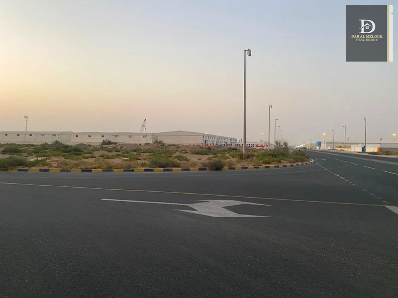 For sale in Sharjah  Al Sajaa Industrial Area  Al Hano Block No. 2  A plot of industrial land area of ​​105,000 square feet  A very special location o63195065530881112