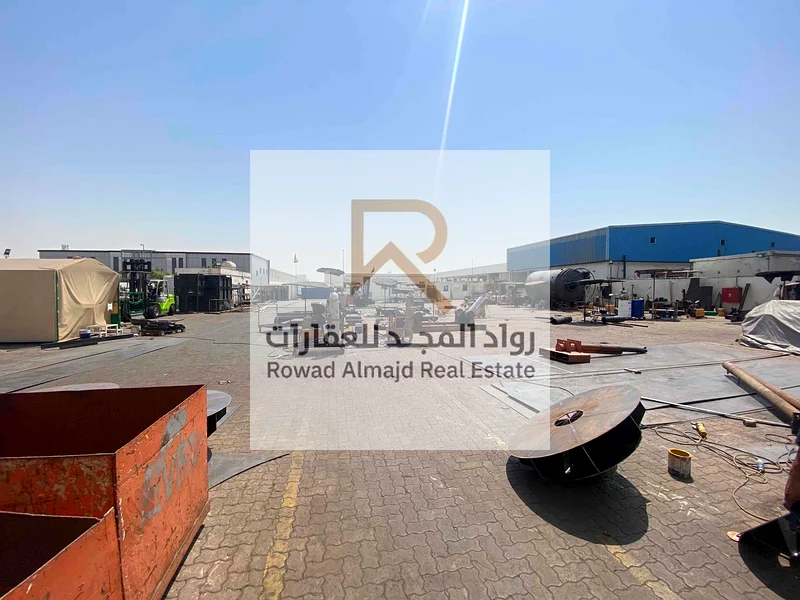 Freehold Warehouse for sale with a fenced plot of land in Emirates Industrial City63195597952257112