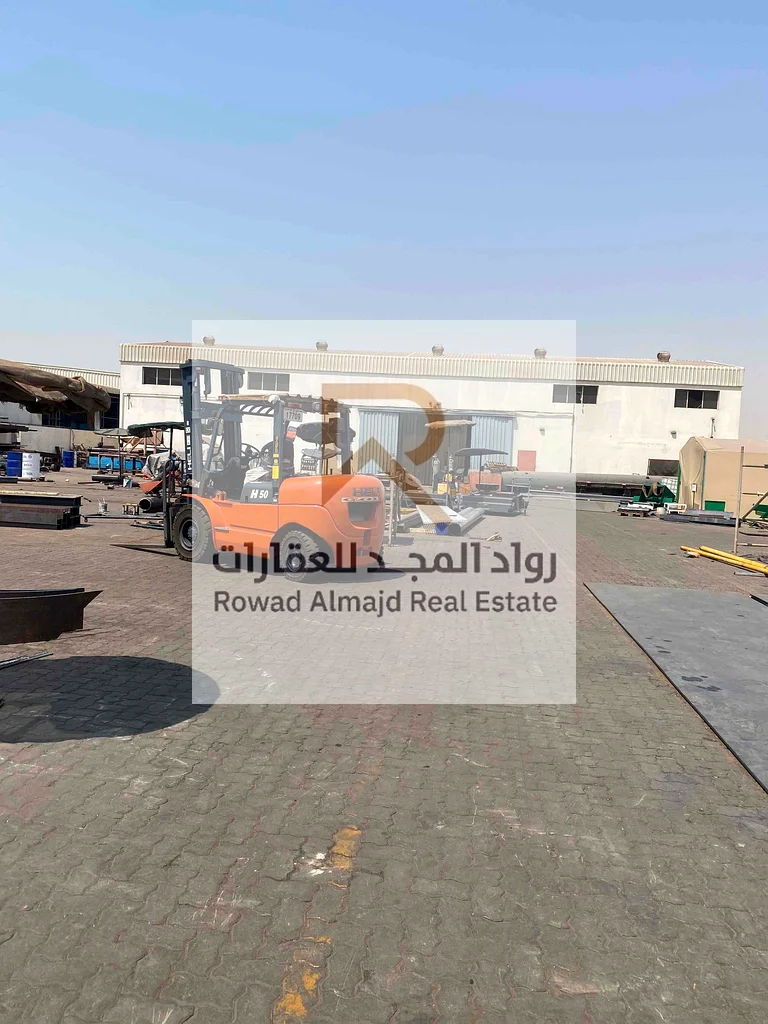 Freehold Warehouse for sale with a fenced plot of land in Emirates Industrial City63195597952257113