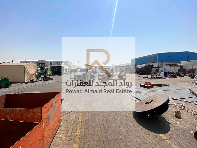 Freehold Warehouse for sale with a fenced plot of land in Emirates Industrial City63195597952257111