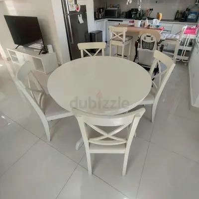 IKEA extendable dining table with 4 chairs