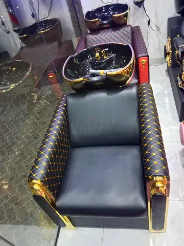 Luxurious Black and Gold Salon Chair with Sink