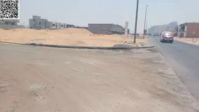 For sale, land in Ajman, Al Helio area, opposite Azhi Zawba, two streets, paved streets, freehold fo