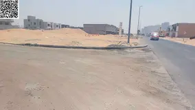 For sale, land in Ajman, Al Helio area, opposite Azhi Zawba, two streets, paved streets, freehold fo